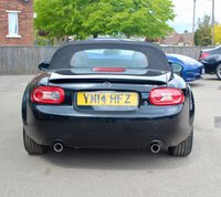 PRE-OWNED 2014 14 MAZDA MX-5 1.8i SE Convertible 2dr Petrol Manual Euro 5 (126 ps) Sparkling Black Metallic, Black Interior, 16" Alloy Wheels, Climate Control Air Conditioning, Upgraded JVC Music System With Apple CarPlay, Rear Spoiler, Remote Central Locking With Deadlocks, Electric Mirrors, Electric Windows, Remote Boot Release, Power Steering, Dynamic Stability Control, Stainless Steel Scuff Plates, Traction Control System, Tyre Pressure Monitoring System, Thatcham Category 1 alarm/Immobiliser, 2 Keys and Book Pack, Service History.