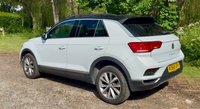 USED 2018 68 VOLKSWAGEN T-ROC 1.5 TSI EVO DESIGN NAV SUV 5 DOOR *APPLE CAR PLAY*ADAPTIVE CRUISE CONTROL*HEATED SEATS*SAT NAV*DAB*DUAL ZONE CLIMATE CONTROL*FRONT AND REAR PARKING SENSORS WITH VISUAL DISPLAY*ALLOY WHEELS*PRIVACY GLASS*REAR SPOILER*ELECTRIC FOLDING DOOR MIRRORS*ELECTRICALLY OPENING TAILGATE*GLOSS BLACK DOOR MIRRORS*GLOSS BLACK ROOF*FANTASTIC SERVICE HISTORY ALL WITH VOLKSWAGEN*8 SERVICES*CAM BELT REPLACED JULY 2024*