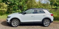 USED 2018 68 VOLKSWAGEN T-ROC 1.5 TSI EVO DESIGN NAV SUV 5 DOOR *APPLE CAR PLAY*ADAPTIVE CRUISE CONTROL*HEATED SEATS*SAT NAV*DAB*DUAL ZONE CLIMATE CONTROL*FRONT AND REAR PARKING SENSORS WITH VISUAL DISPLAY*ALLOY WHEELS*PRIVACY GLASS*REAR SPOILER*ELECTRIC FOLDING DOOR MIRRORS*ELECTRICALLY OPENING TAILGATE*GLOSS BLACK DOOR MIRRORS*GLOSS BLACK ROOF*FANTASTIC SERVICE HISTORY ALL WITH VOLKSWAGEN*8 SERVICES*CAM BELT REPLACED JULY 2024*