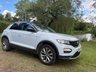 USED 2018 68 VOLKSWAGEN T-ROC 1.5 TSI EVO DESIGN NAV SUV 5 DOOR *APPLE CAR PLAY*ADAPTIVE CRUISE CONTROL*HEATED SEATS*SAT NAV*DAB*DUAL ZONE CLIMATE CONTROL*FRONT AND REAR PARKING SENSORS WITH VISUAL DISPLAY*ALLOY WHEELS*PRIVACY GLASS*REAR SPOILER*ELECTRIC FOLDING DOOR MIRRORS*ELECTRICALLY OPENING TAILGATE*GLOSS BLACK DOOR MIRRORS*GLOSS BLACK ROOF*FANTASTIC SERVICE HISTORY ALL WITH VOLKSWAGEN*8 SERVICES*CAM BELT REPLACED JULY 2024*