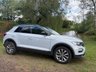 USED 2018 68 VOLKSWAGEN T-ROC 1.5 TSI EVO DESIGN NAV SUV 5 DOOR *APPLE CAR PLAY*ADAPTIVE CRUISE CONTROL*HEATED SEATS*SAT NAV*DAB*DUAL ZONE CLIMATE CONTROL*FRONT AND REAR PARKING SENSORS WITH VISUAL DISPLAY*ALLOY WHEELS*PRIVACY GLASS*REAR SPOILER*ELECTRIC FOLDING DOOR MIRRORS*ELECTRICALLY OPENING TAILGATE*GLOSS BLACK DOOR MIRRORS*GLOSS BLACK ROOF*FANTASTIC SERVICE HISTORY ALL WITH VOLKSWAGEN*8 SERVICES*CAM BELT REPLACED JULY 2024*
