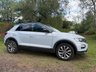 USED 2018 68 VOLKSWAGEN T-ROC 1.5 TSI EVO DESIGN NAV SUV 5 DOOR *APPLE CAR PLAY*ADAPTIVE CRUISE CONTROL*HEATED SEATS*SAT NAV*DAB*DUAL ZONE CLIMATE CONTROL*FRONT AND REAR PARKING SENSORS WITH VISUAL DISPLAY*ALLOY WHEELS*PRIVACY GLASS*REAR SPOILER*ELECTRIC FOLDING DOOR MIRRORS*ELECTRICALLY OPENING TAILGATE*GLOSS BLACK DOOR MIRRORS*GLOSS BLACK ROOF*FANTASTIC SERVICE HISTORY ALL WITH VOLKSWAGEN*8 SERVICES*CAM BELT REPLACED JULY 2024*