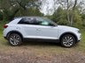 USED 2018 68 VOLKSWAGEN T-ROC 1.5 TSI EVO DESIGN NAV SUV 5 DOOR *APPLE CAR PLAY*ADAPTIVE CRUISE CONTROL*HEATED SEATS*SAT NAV*DAB*DUAL ZONE CLIMATE CONTROL*FRONT AND REAR PARKING SENSORS WITH VISUAL DISPLAY*ALLOY WHEELS*PRIVACY GLASS*REAR SPOILER*ELECTRIC FOLDING DOOR MIRRORS*ELECTRICALLY OPENING TAILGATE*GLOSS BLACK DOOR MIRRORS*GLOSS BLACK ROOF*FANTASTIC SERVICE HISTORY ALL WITH VOLKSWAGEN*8 SERVICES*CAM BELT REPLACED JULY 2024*