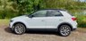 USED 2018 68 VOLKSWAGEN T-ROC 1.5 TSI EVO DESIGN NAV SUV 5 DOOR *APPLE CAR PLAY*ADAPTIVE CRUISE CONTROL*HEATED SEATS*SAT NAV*DAB*DUAL ZONE CLIMATE CONTROL*FRONT AND REAR PARKING SENSORS WITH VISUAL DISPLAY*ALLOY WHEELS*PRIVACY GLASS*REAR SPOILER*ELECTRIC FOLDING DOOR MIRRORS*ELECTRICALLY OPENING TAILGATE*GLOSS BLACK DOOR MIRRORS*GLOSS BLACK ROOF*FANTASTIC SERVICE HISTORY ALL WITH VOLKSWAGEN*8 SERVICES*CAM BELT REPLACED JULY 2024*
