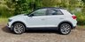 USED 2018 68 VOLKSWAGEN T-ROC 1.5 TSI EVO DESIGN NAV SUV 5 DOOR *APPLE CAR PLAY*ADAPTIVE CRUISE CONTROL*HEATED SEATS*SAT NAV*DAB*DUAL ZONE CLIMATE CONTROL*FRONT AND REAR PARKING SENSORS WITH VISUAL DISPLAY*ALLOY WHEELS*PRIVACY GLASS*REAR SPOILER*ELECTRIC FOLDING DOOR MIRRORS*ELECTRICALLY OPENING TAILGATE*GLOSS BLACK DOOR MIRRORS*GLOSS BLACK ROOF*FANTASTIC SERVICE HISTORY ALL WITH VOLKSWAGEN*8 SERVICES*CAM BELT REPLACED JULY 2024*