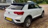 USED 2018 68 VOLKSWAGEN T-ROC 1.5 TSI EVO DESIGN NAV SUV 5 DOOR *APPLE CAR PLAY*ADAPTIVE CRUISE CONTROL*HEATED SEATS*SAT NAV*DAB*DUAL ZONE CLIMATE CONTROL*FRONT AND REAR PARKING SENSORS WITH VISUAL DISPLAY*ALLOY WHEELS*PRIVACY GLASS*REAR SPOILER*ELECTRIC FOLDING DOOR MIRRORS*ELECTRICALLY OPENING TAILGATE*GLOSS BLACK DOOR MIRRORS*GLOSS BLACK ROOF*FANTASTIC SERVICE HISTORY ALL WITH VOLKSWAGEN*8 SERVICES*CAM BELT REPLACED JULY 2024*