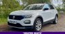 USED 2018 68 VOLKSWAGEN T-ROC 1.5 TSI EVO DESIGN NAV SUV 5 DOOR *APPLE CAR PLAY*ADAPTIVE CRUISE CONTROL*HEATED SEATS*SAT NAV*DAB*DUAL ZONE CLIMATE CONTROL*FRONT AND REAR PARKING SENSORS WITH VISUAL DISPLAY*ALLOY WHEELS*PRIVACY GLASS*REAR SPOILER*ELECTRIC FOLDING DOOR MIRRORS*ELECTRICALLY OPENING TAILGATE*GLOSS BLACK DOOR MIRRORS*GLOSS BLACK ROOF*FANTASTIC SERVICE HISTORY ALL WITH VOLKSWAGEN*8 SERVICES*CAM BELT REPLACED JULY 2024*