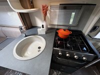 USED 2018 68 SWIFT Champagne 685 5 Belt - 6 Berth - Drop Down Bed - Rear Lounge 