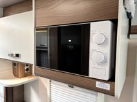 USED 2018 68 SWIFT Champagne 685 5 Belt - 6 Berth - Drop Down Bed - Rear Lounge 