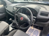 USED 2021 70 FIAT DOBLO Blue 1.4 Petrol Disabled access Crew Cab van, 13,250 miles, Euro 6, 5-Speed manual, Air Conditioning, Rear ramp, Rear sensors, radio. Plus VAT @ 20%! 1.4 Petrol Disabled Access Crew Cab Van 5dr Manual Euro 6 in Blue with just 13,250 miles, ULEZ compliant Euro 6 petrol disabled access crew cab van presented in excellent condition throughout with exceptionally low mileage for its age. This versatile and practical vehicle comes with a great specification including a smooth 5-speed manual gearbox, air conditioning, rear access ramp, rear parking sensors, radio system, spacious crew cab seating and much more! Designed with accessibility and comfor