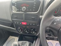 USED 2021 70 FIAT DOBLO Blue 1.4 Petrol Disabled access Crew Cab van, 13,250 miles, Euro 6, 5-Speed manual, Air Conditioning, Rear ramp, Rear sensors, radio. Plus VAT @ 20%! 1.4 Petrol Disabled Access Crew Cab Van 5dr Manual Euro 6 in Blue with just 13,250 miles, ULEZ compliant Euro 6 petrol disabled access crew cab van presented in excellent condition throughout with exceptionally low mileage for its age. This versatile and practical vehicle comes with a great specification including a smooth 5-speed manual gearbox, air conditioning, rear access ramp, rear parking sensors, radio system, spacious crew cab seating and much more! Designed with accessibility and comfor