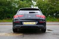 USED 2023 23 MERCEDES-BENZ CLA 1.3 CLA200 AMG Line (Executive) Shooting Brake 5dr Petrol 7G-DCT Euro 6 (s/s) (163 ps) COSMOS BLACK METALLIC PAINTWORK + REVERSE CAMERA + APPLE CARPLAY