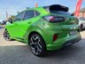 USED 2021 21 FORD PUMA 1.5T EcoBoost ST SUV 5dr Petrol Manual Euro 6 (s/s) (200 ps) Finished in MEAN GREEN MET with HEATED RECARO LEATHER/ALCANTARA Trim. This Ford Puma certainly looks the part, it is the sportiest version of the Puma compact SUV, with meaner looks and a racier setup, It's got the raised up driving position, the eye-catching design, and a miniature SUV shape. Features include Sat Nav with Virtual Dash, DAB Radio, 19" ALLOYS, ST Performance Pack,  B/Tooth, Heated Seats and Steering, Wheel Apple Play, B&O Premium Audio and much more. JUST SERVICED on arrival.