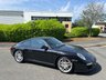 USED 2011 11 PORSCHE 911 3.6 997 Carrera Coupe 2dr Petrol PDK (225 g/km, 345 bhp)-Factory Extras Worth &pound;4,179-Fantastic Low Mileage Example-2 Former Keepers-Last Keeper Since May 2018-Finished In Basalt Black Metallic-Black Leather Upholstery-19 Inch Carrera S Alloy Wheels With Matching Pirelli P Zero Tyres-Sport Chrono Package Plus-Bluetooth-Satnav-Universal Audio Interface-Climate Control-6 Services On File-5 OPC & 1 Specialist Including PDK Service Nov 2025-The Very Best Example. 