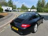 USED 2011 11 PORSCHE 911 3.6 997 Carrera Coupe 2dr Petrol PDK (225 g/km, 345 bhp)-Factory Extras Worth &pound;4,179-Fantastic Low Mileage Example-2 Former Keepers-Last Keeper Since May 2018-Finished In Basalt Black Metallic-Black Leather Upholstery-19 Inch Carrera S Alloy Wheels With Matching Pirelli P Zero Tyres-Sport Chrono Package Plus-Bluetooth-Satnav-Universal Audio Interface-Climate Control-6 Services On File-5 OPC & 1 Specialist Including PDK Service Nov 2025-The Very Best Example. 