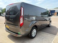 USED 2022 72 FORD TRANSIT CUSTOM Limited L2 H1 2.0 300 EcoBlue LWB Diesel Panel Van Manual Euro 6 (s/s) (130 bhp) 3 Services (2 Ford Services) - Last service with genuine Ford wet belt & filter's replaced - 111,975 miles - EURO 6, A/C, front & rear parking sensors, reversing camera, heated seats, alloys, heated screen, cruise control, Bluetooth, electric power folding mirrors, E/W, DAB Radio with Apple car play, USB port, start/stop, factory fitted bulkhead, colour coded, auto LED headlights, side loading door, ply lined with load liner, spare key, Finance arranged, 6 months Premium AutoGuard warranty