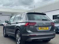 USED 2018 68 VOLKSWAGEN TIGUAN 2.0 TDI SEL SUV 5dr Diesel DSG Euro 6 (s/s) (150 ps) THIS CAR COMES WITH 6 MONTHS WARRANTY , BREAKDOWN COVER & RECOVERY++  GREAT EXAMPLE OF AUTOMATIC SUV + APPLE CAR PLAY/ ANDRIOD AUTO + NAVIGATION SYSTEM + BLUETOOTH + DAB RADIO + USB CONNECTION + PARKING SENSORS + HALF  LEATHER TRIM  + FRONT HEATED SEATS + CRUISE CONTROL + DUAL CLIMATE CONTROL + PRIVACY GLASS + 19 INCH ALLOY WHEELS + PANAROMIC ROOF+ AUTO START STOP + ELECTRIC PARKING BRAKE + ELECTRIC SEAT ADJUSTMENT + TRACTION CONTROL + DAY TIME RUNNING LIGHTS + LUMBAR SUPPORT +