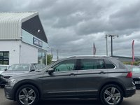 USED 2018 68 VOLKSWAGEN TIGUAN 2.0 TDI SEL SUV 5dr Diesel DSG Euro 6 (s/s) (150 ps) THIS CAR COMES WITH 6 MONTHS WARRANTY , BREAKDOWN COVER & RECOVERY++  GREAT EXAMPLE OF AUTOMATIC SUV + APPLE CAR PLAY/ ANDRIOD AUTO + NAVIGATION SYSTEM + BLUETOOTH + DAB RADIO + USB CONNECTION + PARKING SENSORS + HALF  LEATHER TRIM  + FRONT HEATED SEATS + CRUISE CONTROL + DUAL CLIMATE CONTROL + PRIVACY GLASS + 19 INCH ALLOY WHEELS + PANAROMIC ROOF+ AUTO START STOP + ELECTRIC PARKING BRAKE + ELECTRIC SEAT ADJUSTMENT + TRACTION CONTROL + DAY TIME RUNNING LIGHTS + LUMBAR SUPPORT +
