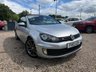 USED 2012 VOLKSWAGEN GOLF 1.4 TSI GT Cabriolet 2dr Petrol Manual Euro 5 (160 ps) 2012 VW Golf 1.4 TSI GT Cabriolet in silver with just 62,810 miles. This is a fantastic open-top with serious GT spec throughout. 158bhp turbocharged engine, 18in Charleston alloys, sports suspension, dual-zone climate control, DAB radio, Bluetooth, parking sensors front and rear, and a fully automatic electric hood. Supplied with a fresh full service, 12 months MOT and our comprehensive 6 month parts and labour warranty. Ready to drive away with confidence. Call us on 01506 853952.