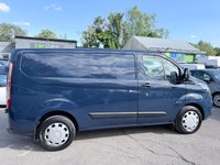 USED 2019 19 FORD TRANSIT CUSTOM Blue 2.0 320 EcoBlue Trend van, 68,700 miles, Euro 6, ULEZ compliant, 6-Speed manual, touchscreen, cruise, DAB, front & rear sensors. Plus VAT @ 20%! This 2019 Ford Transit Custom presents an exceptional ownership proposition, having been meticulously maintained by a single owner from new.  This popular 320 Trend L1 H1 model is powered by an efficient 2.0 litre EcoBlue diesel engine, meeting Euro 6 emission standards.  It comes equipped with both front and rear parking sensors, along with front fog lamps, making manoeuvring in tight spaces considerably easier.  With a mileage of just 68,700 miles, this van has been driven sparingly for its ag