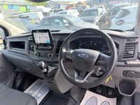 USED 2019 19 FORD TRANSIT CUSTOM Blue 2.0 320 EcoBlue Trend van, 68,700 miles, Euro 6, ULEZ compliant, 6-Speed manual, touchscreen, cruise, DAB, front & rear sensors. Plus VAT @ 20%! This 2019 Ford Transit Custom presents an exceptional ownership proposition, having been meticulously maintained by a single owner from new.  This popular 320 Trend L1 H1 model is powered by an efficient 2.0 litre EcoBlue diesel engine, meeting Euro 6 emission standards.  It comes equipped with both front and rear parking sensors, along with front fog lamps, making manoeuvring in tight spaces considerably easier.  With a mileage of just 68,700 miles, this van has been driven sparingly for its ag