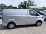 USED 2021 71 FORD TRANSIT CUSTOM Silver 2.0 280 EcoBlue Limited van, 49,800 miles, Euro 6, 6-Speed manual, A/C, Alloys, touchscreen, front & rear sensors. Plus VAT @ 20%! This 2021 Ford Transit Custom offers exceptional value with its remarkably low mileage of just 49,800 miles, especially for a vehicle of its age, and has been meticulously maintained by a single owner.  This 2.0 280 EcoBlue Limited L1 H1 Euro 6 (s/s) 5dr model, a 280 Limited variant with the desirable Limited trim, is powered by an efficient 2.0 litre diesel engine meeting Euro 6 emissions standards.  It comes equipped with the ICE Feature Pack 21, which includes Bluetooth connectivity, and Seat