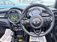 USED 2017 67 MINI CONVERTIBLE 2.0 Cooper S Convertible Automatic, 20,400 miles, 2 owners, full history, Euro 6, Leather interior, Sat Nav, Alloy wheels & great spec throughout. Discover this exceptional 2017 MINI Convertible Cooper S, boasting remarkably low mileage of just 20,400 miles, a testament to its careful ownership by only two previous keepers. This stylish convertible is powered by a responsive 2.0 litre petrol engine, meeting Euro 6 emissions standards. It comes equipped with desirable features including 17 inch Tentacle Spoke alloy wheels in silver, black bonnet stripes for a sporty look, and automatic dual zone air conditioning to ensure comfort for all oc