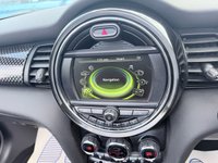 USED 2017 67 MINI CONVERTIBLE 2.0 Cooper S Convertible Automatic, 20,400 miles, 2 owners, full history, Euro 6, Leather interior, Sat Nav, Alloy wheels & great spec throughout. Discover this exceptional 2017 MINI Convertible Cooper S, boasting remarkably low mileage of just 20,400 miles, a testament to its careful ownership by only two previous keepers. This stylish convertible is powered by a responsive 2.0 litre petrol engine, meeting Euro 6 emissions standards. It comes equipped with desirable features including 17 inch Tentacle Spoke alloy wheels in silver, black bonnet stripes for a sporty look, and automatic dual zone air conditioning to ensure comfort for all oc