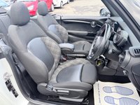 USED 2017 67 MINI CONVERTIBLE 2.0 Cooper S Convertible Automatic, 20,400 miles, 2 owners, full history, Euro 6, Leather interior, Sat Nav, Alloy wheels & great spec throughout. Discover this exceptional 2017 MINI Convertible Cooper S, boasting remarkably low mileage of just 20,400 miles, a testament to its careful ownership by only two previous keepers. This stylish convertible is powered by a responsive 2.0 litre petrol engine, meeting Euro 6 emissions standards. It comes equipped with desirable features including 17 inch Tentacle Spoke alloy wheels in silver, black bonnet stripes for a sporty look, and automatic dual zone air conditioning to ensure comfort for all oc