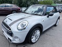 USED 2017 67 MINI CONVERTIBLE 2.0 Cooper S Convertible Automatic, 20,400 miles, 2 owners, full history, Euro 6, Leather interior, Sat Nav, Alloy wheels & great spec throughout. Discover this exceptional 2017 MINI Convertible Cooper S, boasting remarkably low mileage of just 20,400 miles, a testament to its careful ownership by only two previous keepers. This stylish convertible is powered by a responsive 2.0 litre petrol engine, meeting Euro 6 emissions standards. It comes equipped with desirable features including 17 inch Tentacle Spoke alloy wheels in silver, black bonnet stripes for a sporty look, and automatic dual zone air conditioning to ensure comfort for all oc