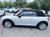 USED 2017 67 MINI CONVERTIBLE 2.0 Cooper S Convertible Automatic, 20,400 miles, 2 owners, full history, Euro 6, Leather interior, Sat Nav, Alloy wheels & great spec throughout. Discover this exceptional 2017 MINI Convertible Cooper S, boasting remarkably low mileage of just 20,400 miles, a testament to its careful ownership by only two previous keepers. This stylish convertible is powered by a responsive 2.0 litre petrol engine, meeting Euro 6 emissions standards. It comes equipped with desirable features including 17 inch Tentacle Spoke alloy wheels in silver, black bonnet stripes for a sporty look, and automatic dual zone air conditioning to ensure comfort for all oc