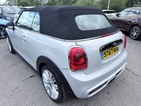 USED 2017 67 MINI CONVERTIBLE 2.0 Cooper S Convertible Automatic, 20,400 miles, 2 owners, full history, Euro 6, Leather interior, Sat Nav, Alloy wheels & great spec throughout. Discover this exceptional 2017 MINI Convertible Cooper S, boasting remarkably low mileage of just 20,400 miles, a testament to its careful ownership by only two previous keepers. This stylish convertible is powered by a responsive 2.0 litre petrol engine, meeting Euro 6 emissions standards. It comes equipped with desirable features including 17 inch Tentacle Spoke alloy wheels in silver, black bonnet stripes for a sporty look, and automatic dual zone air conditioning to ensure comfort for all oc