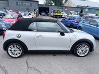 USED 2017 67 MINI CONVERTIBLE 2.0 Cooper S Convertible Automatic, 20,400 miles, 2 owners, full history, Euro 6, Leather interior, Sat Nav, Alloy wheels & great spec throughout. Discover this exceptional 2017 MINI Convertible Cooper S, boasting remarkably low mileage of just 20,400 miles, a testament to its careful ownership by only two previous keepers. This stylish convertible is powered by a responsive 2.0 litre petrol engine, meeting Euro 6 emissions standards. It comes equipped with desirable features including 17 inch Tentacle Spoke alloy wheels in silver, black bonnet stripes for a sporty look, and automatic dual zone air conditioning to ensure comfort for all oc