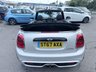 USED 2017 67 MINI CONVERTIBLE 2.0 Cooper S Convertible Automatic, 20,400 miles, 2 owners, full history, Euro 6, Leather interior, Sat Nav, Alloy wheels & great spec throughout. Discover this exceptional 2017 MINI Convertible Cooper S, boasting remarkably low mileage of just 20,400 miles, a testament to its careful ownership by only two previous keepers. This stylish convertible is powered by a responsive 2.0 litre petrol engine, meeting Euro 6 emissions standards. It comes equipped with desirable features including 17 inch Tentacle Spoke alloy wheels in silver, black bonnet stripes for a sporty look, and automatic dual zone air conditioning to ensure comfort for all oc