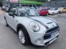 USED 2017 67 MINI CONVERTIBLE 2.0 Cooper S Convertible Automatic, 20,400 miles, 2 owners, full history, Euro 6, Leather interior, Sat Nav, Alloy wheels & great spec throughout. Discover this exceptional 2017 MINI Convertible Cooper S, boasting remarkably low mileage of just 20,400 miles, a testament to its careful ownership by only two previous keepers. This stylish convertible is powered by a responsive 2.0 litre petrol engine, meeting Euro 6 emissions standards. It comes equipped with desirable features including 17 inch Tentacle Spoke alloy wheels in silver, black bonnet stripes for a sporty look, and automatic dual zone air conditioning to ensure comfort for all oc