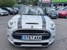USED 2017 67 MINI CONVERTIBLE 2.0 Cooper S Convertible Automatic, 20,400 miles, 2 owners, full history, Euro 6, Leather interior, Sat Nav, Alloy wheels & great spec throughout. Discover this exceptional 2017 MINI Convertible Cooper S, boasting remarkably low mileage of just 20,400 miles, a testament to its careful ownership by only two previous keepers. This stylish convertible is powered by a responsive 2.0 litre petrol engine, meeting Euro 6 emissions standards. It comes equipped with desirable features including 17 inch Tentacle Spoke alloy wheels in silver, black bonnet stripes for a sporty look, and automatic dual zone air conditioning to ensure comfort for all oc