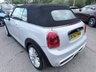 USED 2017 67 MINI CONVERTIBLE 2.0 Cooper S Convertible Automatic, 20,400 miles, 2 owners, full history, Euro 6, Leather interior, Sat Nav, Alloy wheels & great spec throughout. Discover this exceptional 2017 MINI Convertible Cooper S, boasting remarkably low mileage of just 20,400 miles, a testament to its careful ownership by only two previous keepers. This stylish convertible is powered by a responsive 2.0 litre petrol engine, meeting Euro 6 emissions standards. It comes equipped with desirable features including 17 inch Tentacle Spoke alloy wheels in silver, black bonnet stripes for a sporty look, and automatic dual zone air conditioning to ensure comfort for all oc