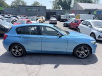 USED 2018 BMW 1 SERIES Blue 1.5 116d Sport hatchback, 83,000 miles, Euro 6, 6-speed manual, 17in alloys, Sat nav, Bluetooth, Air Conditioning, Rear sensors and much more! This 2018 BMW 1 Series 116d Sport is a Euro 6 compliant vehicle, offering an efficient 1.5L diesel engine. This Sport trim model comes equipped with stylish Dark Chrome exhaust tailpipes, enhancing its sporty appearance. For convenience and connectivity, it features Bluetooth hands free with USB audio interface, allowing for seamless music streaming and call handling. Driving in varied conditions is made easier with the rain sensor and automatic headlight activation, ensuring optimal visibility.