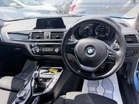 USED 2018 BMW 1 SERIES Blue 1.5 116d Sport hatchback, 83,000 miles, Euro 6, 6-speed manual, 17in alloys, Sat nav, Bluetooth, Air Conditioning, Rear sensors and much more! This 2018 BMW 1 Series 116d Sport is a Euro 6 compliant vehicle, offering an efficient 1.5L diesel engine. This Sport trim model comes equipped with stylish Dark Chrome exhaust tailpipes, enhancing its sporty appearance. For convenience and connectivity, it features Bluetooth hands free with USB audio interface, allowing for seamless music streaming and call handling. Driving in varied conditions is made easier with the rain sensor and automatic headlight activation, ensuring optimal visibility.