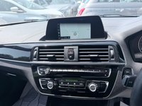 USED 2018 BMW 1 SERIES Blue 1.5 116d Sport hatchback, 83,000 miles, Euro 6, 6-speed manual, 17in alloys, Sat nav, Bluetooth, Air Conditioning, Rear sensors and much more! This 2018 BMW 1 Series 116d Sport is a Euro 6 compliant vehicle, offering an efficient 1.5L diesel engine. This Sport trim model comes equipped with stylish Dark Chrome exhaust tailpipes, enhancing its sporty appearance. For convenience and connectivity, it features Bluetooth hands free with USB audio interface, allowing for seamless music streaming and call handling. Driving in varied conditions is made easier with the rain sensor and automatic headlight activation, ensuring optimal visibility.