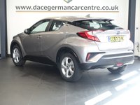 USED 2017 67 TOYOTA C-HR 1.8 VVT-h Icon SUV 5dr Petrol Hybrid CVT Euro 6 (s/s) (122 ps) FULL SERVICE HISTORY + SATELLITE NAVIGATION + REAR VIEW CAMERA + TOUCH SCREEN MEDIA DISPLAY + APPS CONTROL + DAB DIGITAL RADIO + BLUETOOTH PHONE CONNECTIVITY + CRUISE CONTROL + CLIMATE CONTROLLED AIRCONDITIONING + LEATHER MULTI FUNCTIONAL STEERING WHEEL + AUOMATIC WIPERS WITH RAIN SENSORS + HILL HOLD START ASSIST + IN CAR ENTERTAINMENT AUX/USB + DAY TIME RUNNING LIGHTS + AUTO DIMMING REAR VIEW MIRROR + ELECTRIC FRONT AND REAR WINDOWS + ELECTRIC HEATED POWER MIRRORS + 17 INCH ALLOY WHEELS