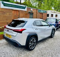 USED 2019 69 LEXUS UX 2.0 250h SUV 5dr Petrol Hybrid E-CVT E-FOUR Euro 6 (s/s) (184 ps) One owner from new with Full Lexus main dealer service history all done at Lexus Bolton. 5 services in total and only 15k miles. Sunroof with rich cream leather. Adaptive cruise control, with reverse camera. Also has the heads up display. Reverse camera. absolutely beautiful and faultless.