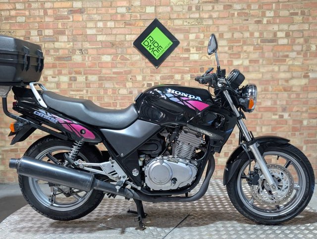 View our Honda CB 500 R - RACK AND BOX - LOW MILEAGE - LOVELY BIKE.