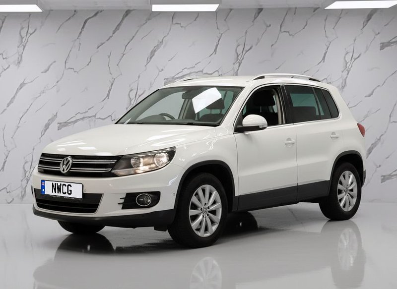 2013 Volkswagen Tiguan in white — photo 3 of 7