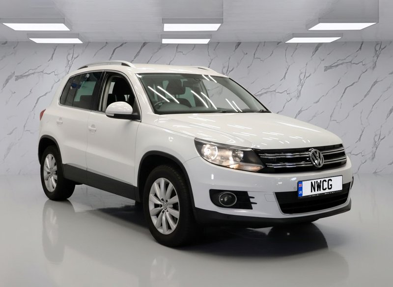 2013 Volkswagen Tiguan in white — photo 1 of 7