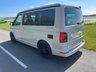 USED 2022 72 VOLKSWAGEN CALIFORNIA 2.0 BiTDI Ocean Camper 4dr Diesel DSG Euro 6 (s/s) (204 ps) AUTOMATIC DSG - Absolutely stunning 4 berth ready for your family adventures! Super modern styling combined with practicality and loaded with storage space, this camper has it all. Electric pop-top, reversing camera, heated seats, sat nav, parking sensors, digital control panel, infotainment system with bluetooth, adjustable suspension, wind out awning and outdoor shower point. On the habitation side the pop top sleeps two with a memory foam mattress, rock and roll bed underneath which easily converts to a double bed. Tonnes of cupboard storage space - even a vanity cupboard above the sink! Kitchen is fully equipped with glass worktops, gas hob, sink and icebox. sliding doors provide under counter access to storage with soft close cutlery drawer. Inside the back door there is a bench seat perfect for relaxing and taking in the views, stow away chairs, more storage space and an outdoor shower point. This camper must be seen to be appreciated! Yours for �&pound;63,995. Up to 7 years finance and warranty packages available, DIMENSIONS: LENGTH - 4.9M, WIDTH - 1.9M, HEIGHT (ROOF CLOSED) - 1.99M 