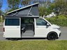 USED 2022 72 VOLKSWAGEN CALIFORNIA 2.0 BiTDI Ocean Camper 4dr Diesel DSG Euro 6 (s/s) (204 ps) AUTOMATIC DSG - Absolutely stunning 4 berth ready for your family adventures! Super modern styling combined with practicality and loaded with storage space, this camper has it all. Electric pop-top, reversing camera, heated seats, sat nav, parking sensors, digital control panel, infotainment system with bluetooth, adjustable suspension, wind out awning and outdoor shower point. On the habitation side the pop top sleeps two with a memory foam mattress, rock and roll bed underneath which easily converts to a double bed. Tonnes of cupboard storage space - even a vanity cupboard above the sink! Kitchen is fully equipped with glass worktops, gas hob, sink and icebox. sliding doors provide under counter access to storage with soft close cutlery drawer. Inside the back door there is a bench seat perfect for relaxing and taking in the views, stow away chairs, more storage space and an outdoor shower point. This camper must be seen to be appreciated! Yours for �&pound;63,995. Up to 7 years finance and warranty packages available, DIMENSIONS: LENGTH - 4.9M, WIDTH - 1.9M, HEIGHT (ROOF CLOSED) - 1.99M 