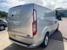 USED 2023 73 FORD TRANSIT CUSTOM Limited L2 H1 2.0 300 EcoBlue LWB Diesel Panel Van Manual Euro 6 (s/s) (130 bhp) Recent service with all genuine Ford filters fitted - Only 28,569 miles - EURO 6, SATNAV, A/C, front & rear parking sensors, heated seats, alloys, heated screen, cruise control, Bluetooth, electric power folding mirrors, E/W, DAB Radio with Apple car play, USB port, start/stop, driver's airbag, factory fitted bulkhead, colour coded, auto LED headlights, side loading door, ply lined with load liner, remote Central Locking, spare key, finance arranged, 6 months premium AutoGuard warranty