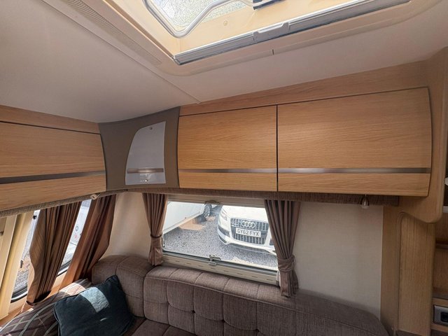 View our COACHMAN PASTICHE