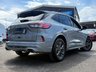 USED 2021 21 FORD KUGA 2.5 EcoBoost Duratec 14.4kWh ST-Line SUV 5dr Petrol Plug-in Hybrid CVT Euro 6 (s/s) (225 ps) Finished in SOLAR SILVER MET with contrasting BLACK ALCANTARA TRIM. This Kuga is a great choice if you like driving. It's one of the most enjoyable, practical and fun family SUV's around. Features include Sat Nav, Virtual Dash, Power Folding Door Mirrors, Front and Rear Park Sensors, DAB, B/Tooth, Cruise and much more. Serviced at 17627 miles, 37196 miles, 55000 miles and at 61445 miles on 19/01/2026.